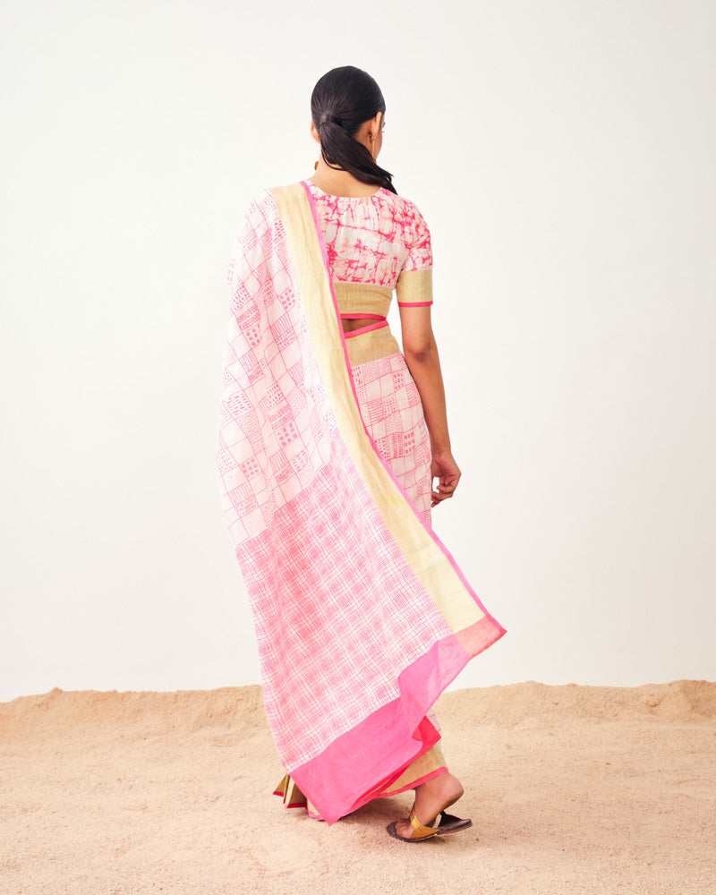 
                  
                    Rani Pink Pure Linen Print With Golden Border Saree
                  
                